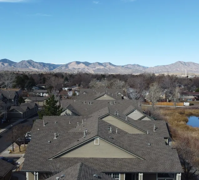 Core Roofing Systems crew installing architectural shingles in Denver