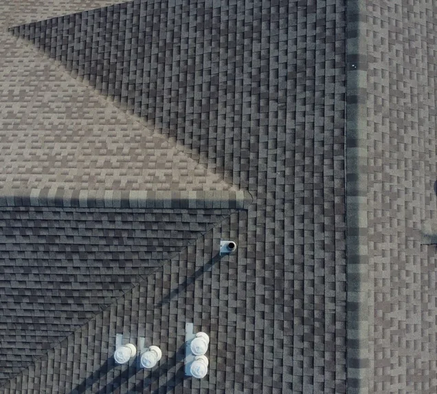 Core Roofing Systems crew installing architectural shingles on a Denver home