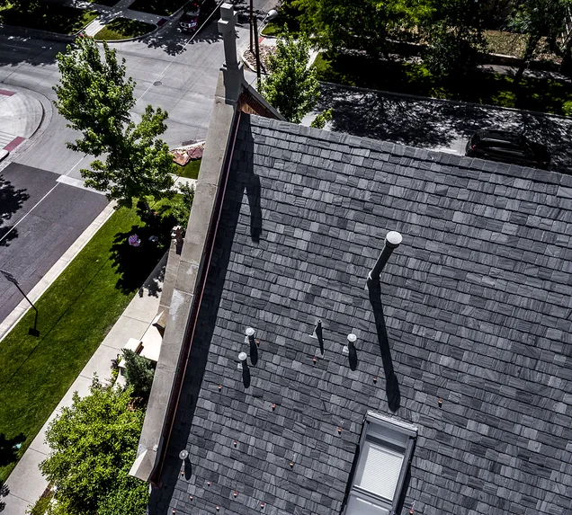 Core Roofing Systems inspector documenting commercial roof conditions in Denver
