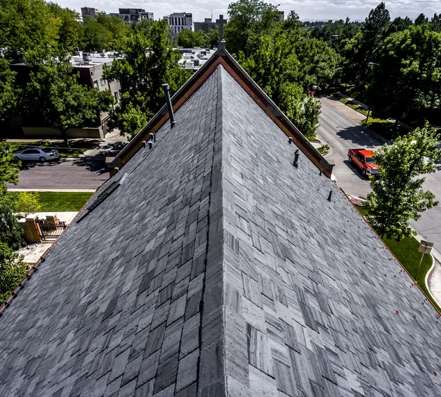 Core Roofing Systems crew diagnosing commercial roof leak in Denver