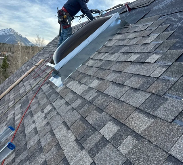 Core Roofing Systems crew installing a skylight in a Denver home