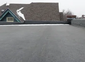 Flat low-slope residential roofing installed by Core Roofing Systems