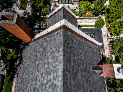 Close-up of commercial roof flashing inspection by Core Roofing Systems in Denver