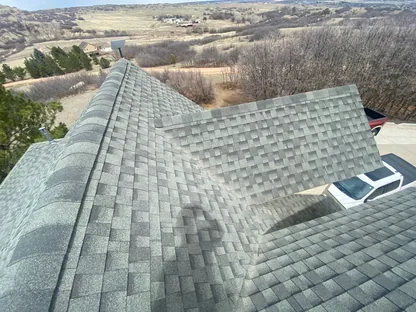 Core Roofing Systems inspector documenting roof conditions for HOA compliance in Denver
