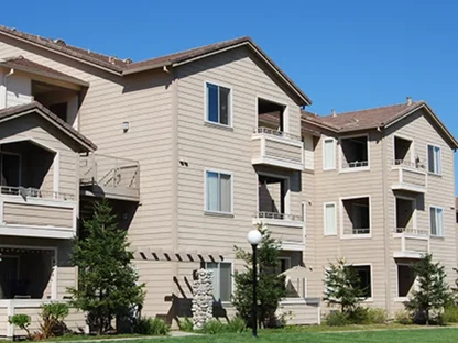 Quarterly roof maintenance documentation being completed on a Denver apartment building
