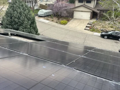 Core Roofing Systems coordinating solar panel detach prior to a residential roof replacement in Denver