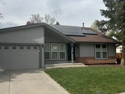 Solar panels safely staged on-site during a Core Roofing Systems roof replacement in Denver